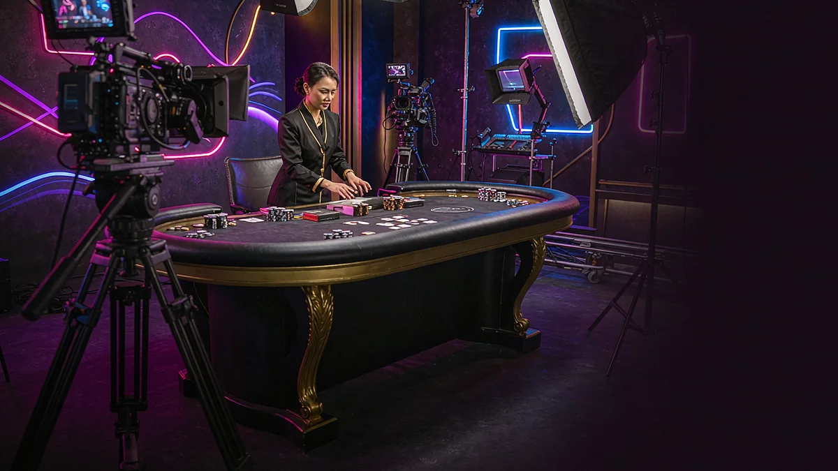 Camera and studio lighting facing a casino table — w555 guidance Camera and studio lighting facing a casino table